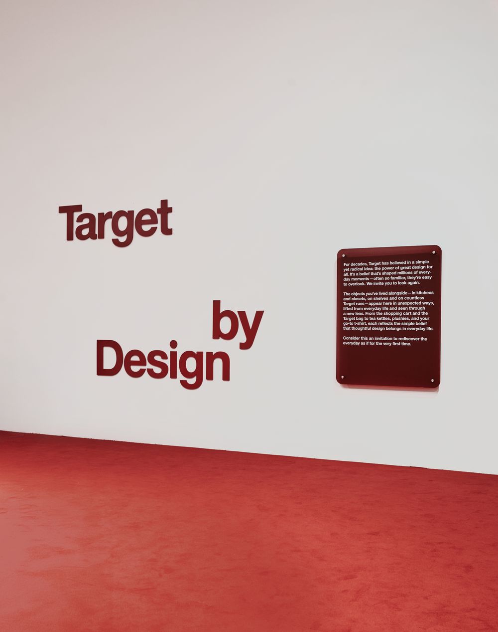 The Target by Design wordmark on a gallery wall